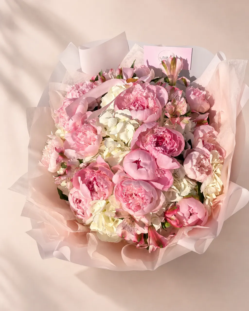 Peonies with hydrangeas and alstroemeria