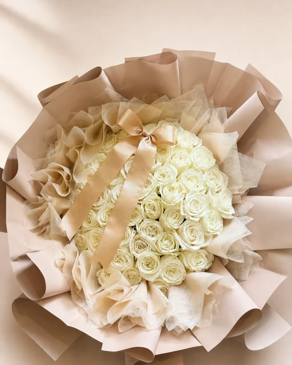 Cashmere Rose: 100 white roses with initial and ribbon, photographed on a blush backdrop