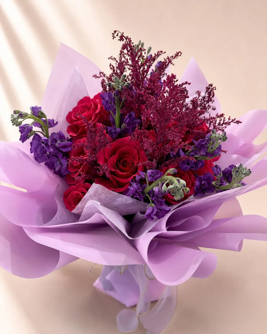 Florist's Palette: Mixed roses with stock and fillers, photographed on a blush backdrop