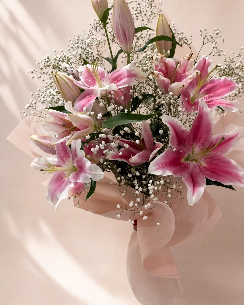 Lily Haze: Pink oriental lilies with baby's breath, photographed on a blush backdrop