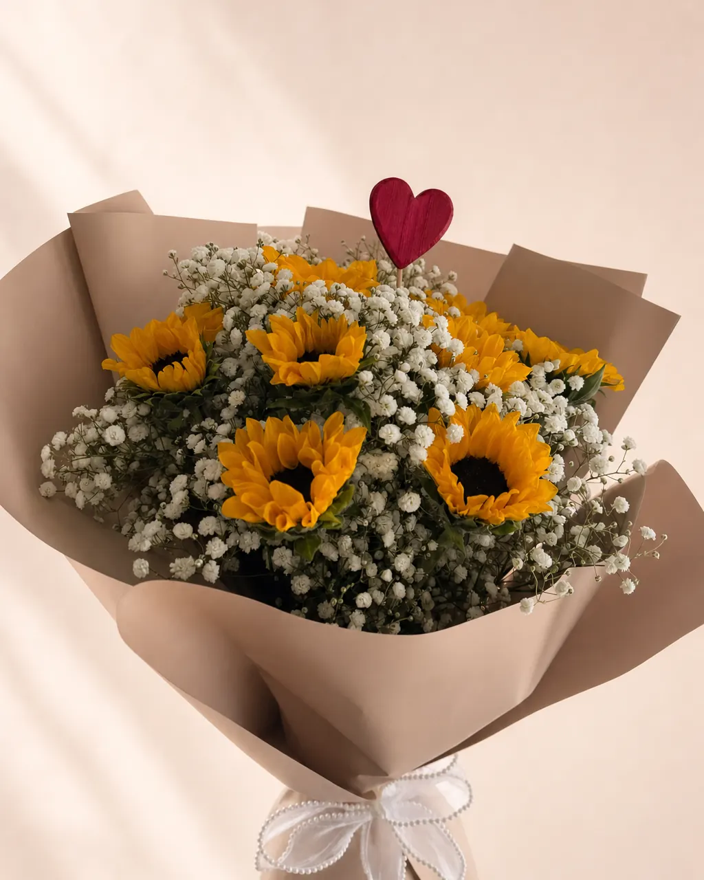 Meadow Light: 15 sunflowers with baby's breath, photographed on a blush backdrop