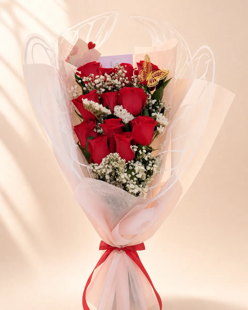Rose Ladder: 12 roses in a flat wrap, red, pink or white, photographed on a blush backdrop